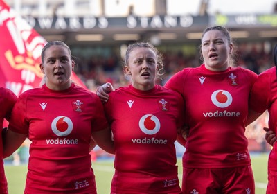 260926 Wales v USA, Vodafone Wales WXV Series - Freya Bell of Wales, Lleucu George of Wales and Gwen Crabb of Wales during the anthems