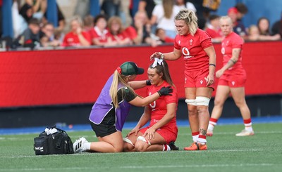 260926 Wales v USA, Vodafone Wales WXV Series - Bryonie King of Wales is treated by Erin Lynch, Wales National Squad Physio