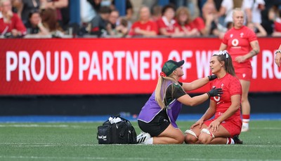 260926 Wales v USA, Vodafone Wales WXV Series - Bryonie King of Wales is treated by Erin Lynch, Wales National Squad Physio