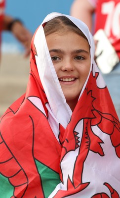 260926 Wales v USA, Vodafone Wales WXV Series - Young Wales fan wrapped in a Wales flag