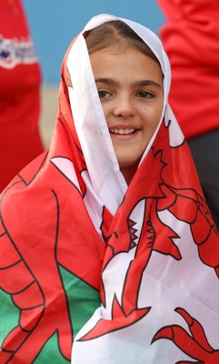 260926 Wales v USA, Vodafone Wales WXV Series - Young Wales fan wrapped in a Wales flag