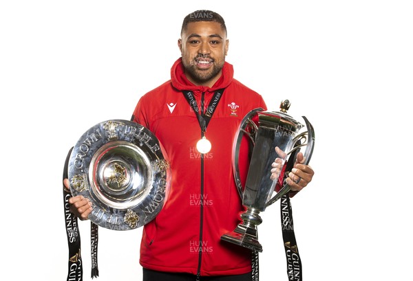 270321 - Wales Rugby Team Presented with Guinness Six Nations Trophy -  Taulupe Faletau with the trophy and triple crown
