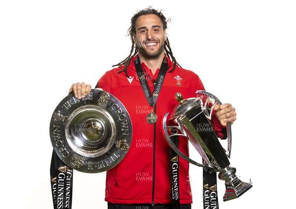 270321 - Wales Rugby Team Presented with Guinness Six Nations Trophy -  Josh Navidi with the trophy and triple crown