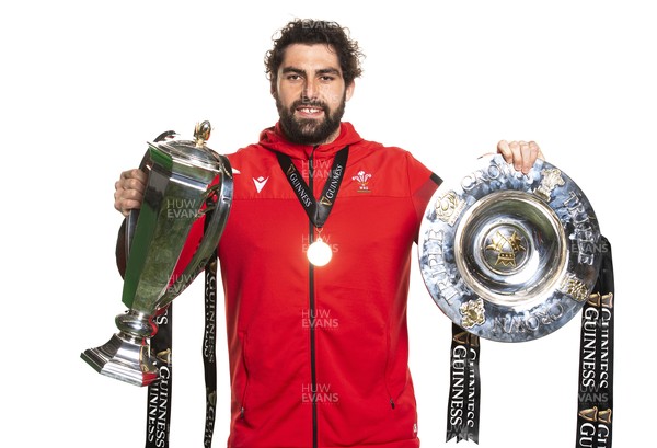 270321 - Wales Rugby Team Presented with Guinness Six Nations Trophy -  Cory Hill with the trophy and triple crown