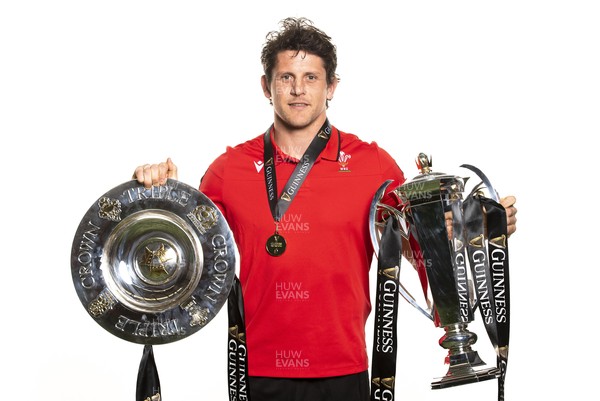 270321 - Wales Rugby Team Presented with Guinness Six Nations Trophy -  Lloyd Williams with the trophy and triple crown