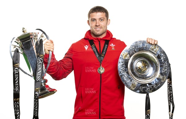 270321 - Wales Rugby Team Presented with Guinness Six Nations Trophy -  Leigh Halfpenny with the trophy and triple crown