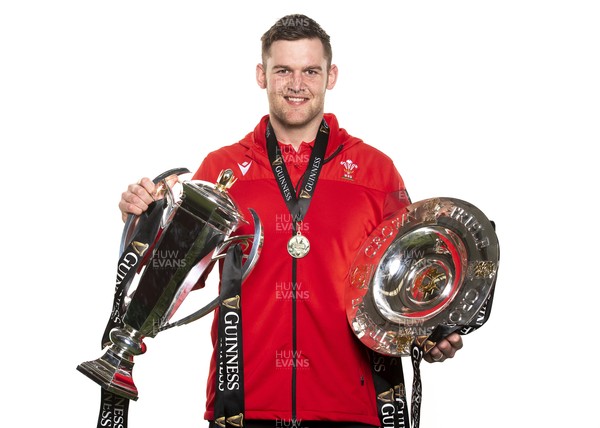 270321 - Wales Rugby Team Presented with Guinness Six Nations Trophy -  Dan Lydiate with the trophy and triple crown