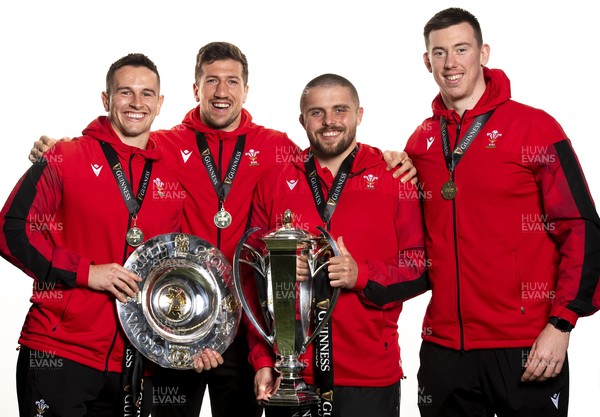 270321 - Wales Rugby Team Presented with Guinness Six Nations Trophy -  Owen Watkin, Justin Tipuric, Nicky Smith and Adam Beard with the trophy and triple crown