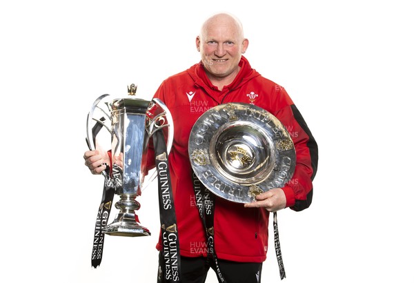 270321 - Wales Rugby Team Presented with Guinness Six Nations Trophy -  Neil Jenkins with the trophy and the triple crown