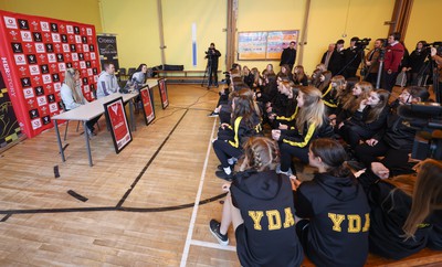 080323 - Wales Women 6 Nations Squad Announcement, Ysgol Dyffryn Aman, Ammanford - Wales Women Rugby head coach Ioan Cunningham and players Hannah Jones, left and Ffion Lewis return to their former school to speak to girls about their rugby careers and to formally announce the Wales Women’s squad for the forthcoming Women’s 6 Nations