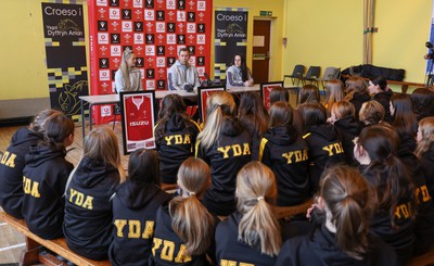 080323 - Wales Women 6 Nations Squad Announcement, Ysgol Dyffryn Aman, Ammanford - Wales Women Rugby head coach Ioan Cunningham and players Hannah Jones, left and Ffion Lewis return to their former school to speak to girls about their rugby careers and to formally announce the Wales Women’s squad for the forthcoming Women’s 6 Nations