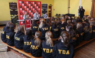 080323 - Wales Women 6 Nations Squad Announcement, Ysgol Dyffryn Aman, Ammanford - Wales Women Rugby head coach Ioan Cunningham and players Hannah Jones, left and Ffion Lewis return to their former school to speak to girls about their rugby careers and to formally announce the Wales Women’s squad for the forthcoming Women’s 6 Nations