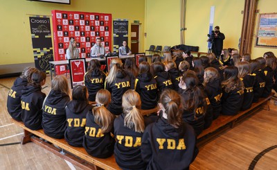 080323 - Wales Women 6 Nations Squad Announcement, Ysgol Dyffryn Aman, Ammanford - Wales Women Rugby head coach Ioan Cunningham and players Hannah Jones, left and Ffion Lewis return to their former school to speak to girls about their rugby careers and to formally announce the Wales Women’s squad for the forthcoming Women’s 6 Nations