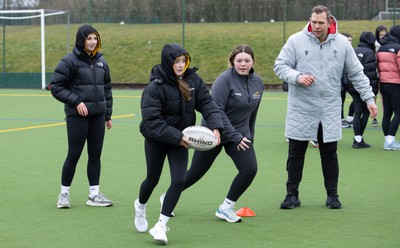 080323 - Wales Women 6 Nations Squad Announcement, Ysgol Dyffryn Aman, Ammanford - Wales Women Rugby head coach Ioan Cunningham and players Hannah Jones and Ffion Lewis return to their former school and take a girls rugby skills session after the girls helped to formally announce the Wales Women’s squad for the forthcoming Women’s 6 Nations