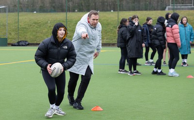 080323 - Wales Women 6 Nations Squad Announcement, Ysgol Dyffryn Aman, Ammanford - Wales Women Rugby head coach Ioan Cunningham and players Hannah Jones and Ffion Lewis return to their former school and take a girls rugby skills session after the girls helped to formally announce the Wales Women’s squad for the forthcoming Women’s 6 Nations