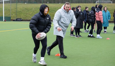 080323 - Wales Women 6 Nations Squad Announcement, Ysgol Dyffryn Aman, Ammanford - Wales Women Rugby head coach Ioan Cunningham and players Hannah Jones and Ffion Lewis return to their former school and take a girls rugby skills session after the girls helped to formally announce the Wales Women’s squad for the forthcoming Women’s 6 Nations