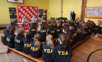 080323 - Wales Women 6 Nations Squad Announcement, Ysgol Dyffryn Aman, Ammanford - Wales Women Rugby head coach Ioan Cunningham and players Hannah Jones, left and Ffion Lewis return to their former school to speak to girls about their rugby careers and to formally announce the Wales Women’s squad for the forthcoming Women’s 6 Nations