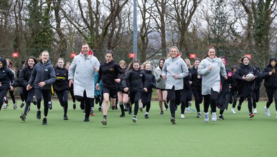 080323 - Wales Women 6 Nations Squad Announcement, Ysgol Dyffryn Aman, Ammanford - Wales Women Rugby head coach Ioan Cunningham and players Hannah Jones and Ffion Lewis return to their former school and take a girls rugby skills session after the girls helped to formally announce the Wales Women’s squad for the forthcoming Women’s 6 Nations