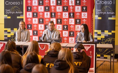 080323 - Wales Women 6 Nations Squad Announcement, Ysgol Dyffryn Aman, Ammanford - Wales Women Rugby head coach Ioan Cunningham and players Hannah Jones, left and Ffion Lewis return to their former school to speak to girls about their rugby careers and to formally announce the Wales Women’s squad for the forthcoming Women’s 6 Nations