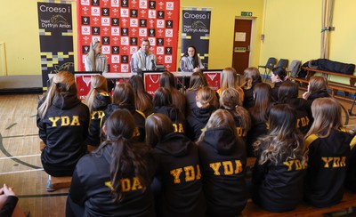 080323 - Wales Women 6 Nations Squad Announcement, Ysgol Dyffryn Aman, Ammanford - Wales Women Rugby head coach Ioan Cunningham and players Hannah Jones, left and Ffion Lewis return to their former school to speak to girls about their rugby careers and to formally announce the Wales Women’s squad for the forthcoming Women’s 6 Nations