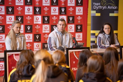 080323 - Wales Women 6 Nations Squad Announcement, Ysgol Dyffryn Aman, Ammanford - Wales Women Rugby head coach Ioan Cunningham and players Hannah Jones, left and Ffion Lewis return to their former school to speak to girls about their rugby careers and to formally announce the Wales Women’s squad for the forthcoming Women’s 6 Nations