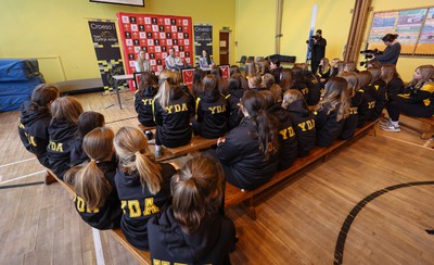 080323 - Wales Women 6 Nations Squad Announcement, Ysgol Dyffryn Aman, Ammanford - Wales Women Rugby head coach Ioan Cunningham and players Hannah Jones, left and Ffion Lewis return to their former school to speak to girls about their rugby careers and to formally announce the Wales Women’s squad for the forthcoming Women’s 6 Nations