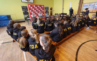 080323 - Wales Women 6 Nations Squad Announcement, Ysgol Dyffryn Aman, Ammanford - Wales Women Rugby head coach Ioan Cunningham and players Hannah Jones, left and Ffion Lewis return to their former school to speak to girls about their rugby careers and to formally announce the Wales Women’s squad for the forthcoming Women’s 6 Nations