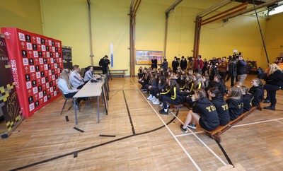 080323 - Wales Women 6 Nations Squad Announcement, Ysgol Dyffryn Aman, Ammanford - Wales Women Rugby head coach Ioan Cunningham and players Hannah Jones, left and Ffion Lewis return to their former school to speak to girls about their rugby careers and to formally announce the Wales Women’s squad for the forthcoming Women’s 6 Nations