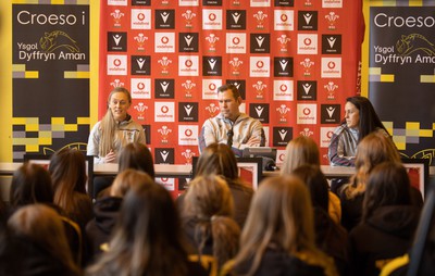 080323 - Wales Women 6 Nations Squad Announcement, Ysgol Dyffryn Aman, Ammanford - Wales Women Rugby head coach Ioan Cunningham and players Hannah Jones, left and Ffion Lewis return to their former school to speak to girls about their rugby careers and to formally announce the Wales Women’s squad for the forthcoming Women’s 6 Nations