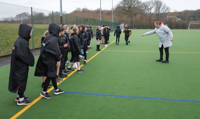 080323 - Wales Women 6 Nations Squad Announcement, Ysgol Dyffryn Aman, Ammanford - Wales Women Rugby head coach Ioan Cunningham and players Hannah Jones and Ffion Lewis return to their former school and take a girls rugby skills session after the girls helped to formally announce the Wales Women’s squad for the forthcoming Women’s 6 Nations