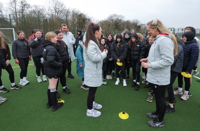 080323 - Wales Women 6 Nations Squad Announcement, Ysgol Dyffryn Aman, Ammanford - Wales Women Rugby head coach Ioan Cunningham and players Hannah Jones and Ffion Lewis return to their former school and take a girls rugby skills session after the girls helped to formally announce the Wales Women’s squad for the forthcoming Women’s 6 Nations