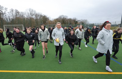 080323 - Wales Women 6 Nations Squad Announcement, Ysgol Dyffryn Aman, Ammanford - Wales Women players Hannah Jones and Ffion Lewis return to their former school and take a girls rugby skills session after the girls helped to formally announce the Wales Women’s squad for the forthcoming Women’s 6 Nations