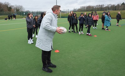 080323 - Wales Women 6 Nations Squad Announcement, Ysgol Dyffryn Aman, Ammanford - Wales Women Rugby head coach Ioan Cunningham and players Hannah Jones and Ffion Lewis return to their former school and take a girls rugby skills session after the girls helped to formally announce the Wales Women’s squad for the forthcoming Women’s 6 Nations