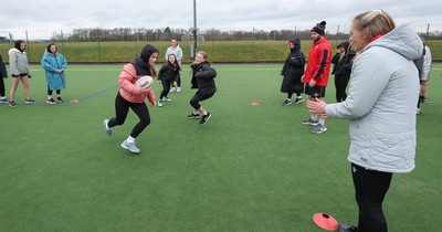 080323 - Wales Women 6 Nations Squad Announcement, Ysgol Dyffryn Aman, Ammanford - Wales Women players Hannah Jones and Ffion Lewis return to their former school and take a girls rugby skills session after the girls helped to formally announce the Wales Women’s squad for the forthcoming Women’s 6 Nations