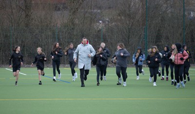 080323 - Wales Women 6 Nations Squad Announcement, Ysgol Dyffryn Aman, Ammanford - Wales Women Rugby head coach Ioan Cunningham and players Hannah Jones and Ffion Lewis return to their former school and take a girls rugby skills session after the girls helped to formally announce the Wales Women’s squad for the forthcoming Women’s 6 Nations