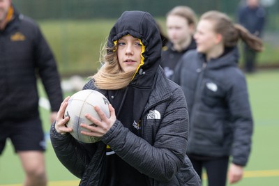 080323 - Wales Women 6 Nations Squad Announcement, Ysgol Dyffryn Aman, Ammanford - Wales Women Rugby head coach Ioan Cunningham and players Hannah Jones and Ffion Lewis return to their former school and take a girls rugby skills session after the girls helped to formally announce the Wales Women’s squad for the forthcoming Women’s 6 Nations