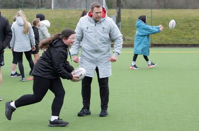 080323 - Wales Women 6 Nations Squad Announcement, Ysgol Dyffryn Aman, Ammanford - Wales Women Rugby head coach Ioan Cunningham and players Hannah Jones and Ffion Lewis return to their former school and take a girls rugby skills session after the girls helped to formally announce the Wales Women’s squad for the forthcoming Women’s 6 Nations