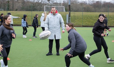 080323 - Wales Women 6 Nations Squad Announcement, Ysgol Dyffryn Aman, Ammanford - Wales Women Rugby head coach Ioan Cunningham and players Hannah Jones and Ffion Lewis return to their former school and take a girls rugby skills session after the girls helped to formally announce the Wales Women’s squad for the forthcoming Women’s 6 Nations