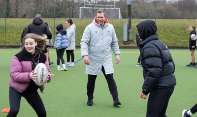 080323 - Wales Women 6 Nations Squad Announcement, Ysgol Dyffryn Aman, Ammanford - Wales Women Rugby head coach Ioan Cunningham and players Hannah Jones and Ffion Lewis return to their former school and take a girls rugby skills session after the girls helped to formally announce the Wales Women’s squad for the forthcoming Women’s 6 Nations