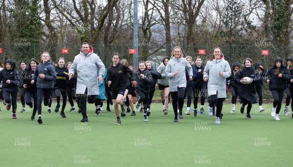 080323 - Wales Women 6 Nations Squad Announcement, Ysgol Dyffryn Aman, Ammanford - Wales Women Rugby head coach Ioan Cunningham and players Hannah Jones and Ffion Lewis return to their former school and take a girls rugby skills session after the girls helped to formally announce the Wales Women’s squad for the forthcoming Women’s 6 Nations