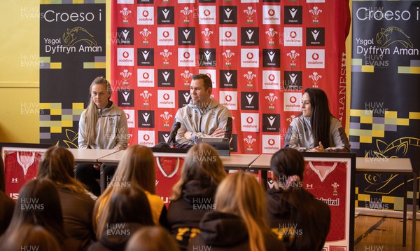 080323 - Wales Women 6 Nations Squad Announcement, Ysgol Dyffryn Aman, Ammanford - Wales Women Rugby head coach Ioan Cunningham and players Hannah Jones, left and Ffion Lewis return to their former school to speak to girls about their rugby careers and to formally announce the Wales Women’s squad for the forthcoming Women’s 6 Nations
