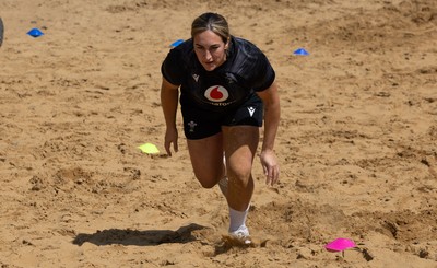130625 Wales Women Rugby Squad Training at Merthyr Mawr dunes - Courtney Keight during a training and conditioning session at Merthyr Mawr sand dunes