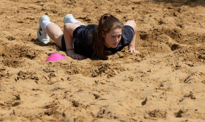 130625 Wales Women Rugby Squad Training at Merthyr Mawr dunes - Lisa Neumann during a training and conditioning session at Merthyr Mawr sand dunes