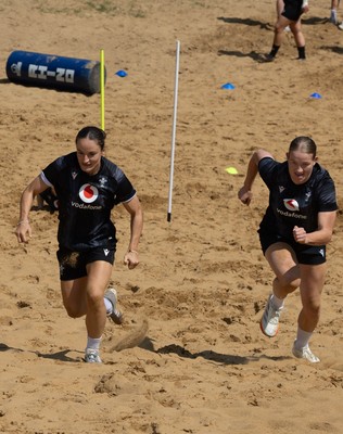 130625 Wales Women Rugby Squad Training at Merthyr Mawr dunes - Jasmine Joyce and Carys Cox during a training and conditioning session at Merthyr Mawr sand dunes