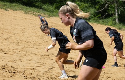 130625 Wales Women Rugby Squad Training at Merthyr Mawr dunes - Keira Bevan and Seren Lockwood during a training and conditioning session at Merthyr Mawr sand dunes