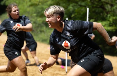 130625 Wales Women Rugby Squad Training at Merthyr Mawr dunes - Donna Rose during a training and conditioning session at Merthyr Mawr sand dunes