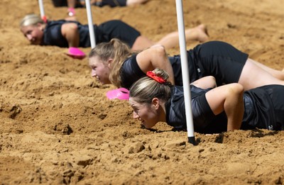 130625 Wales Women Rugby Squad Training at Merthyr Mawr dunes - Gwen Crabb and Alaw Pyrs during a training and conditioning session at Merthyr Mawr sand dunes