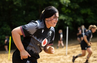 130625 Wales Women Rugby Squad Training at Merthyr Mawr dunes - Lucy Isaac during a training and conditioning session at Merthyr Mawr sand dunes