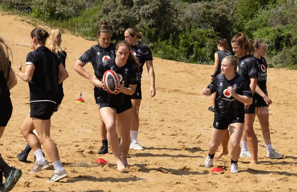 130625 Wales Women Rugby Squad Training at Merthyr Mawr dunes - Lisa Neumann and Seren Lockwood during a training and conditioning session at Merthyr Mawr sand dunes