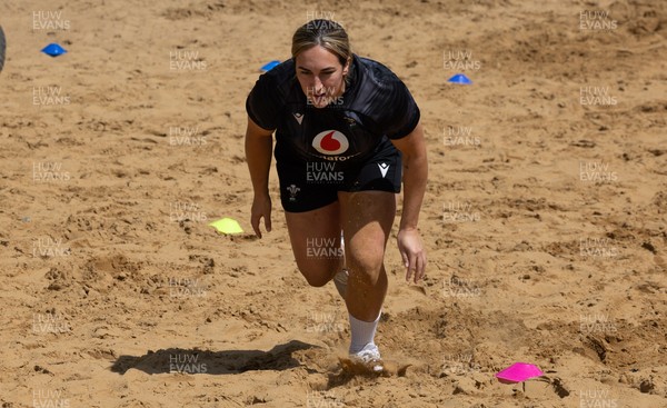130625 Wales Women Rugby Squad Training at Merthyr Mawr dunes - Courtney Keight during a training and conditioning session at Merthyr Mawr sand dunes